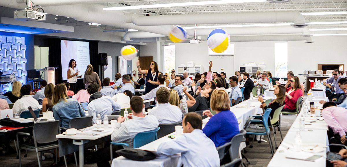 Hospitality Sales Training is a fun time as evidenced by the sun glasses and beach balls being tossed around.