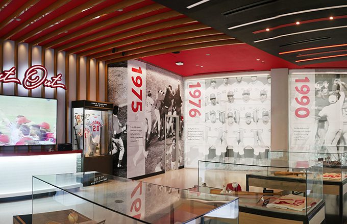 Interiors photo of Reds Hall of Fame including graphic roller solar shades by app